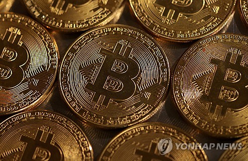 "홍콩, 비트코인·이더리움 현물 ETF 첫 승인"<로이터>/BITCOIN