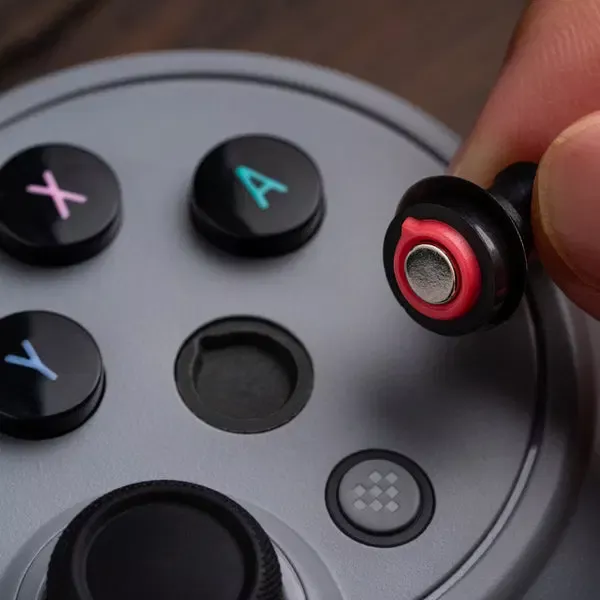 8BitDo Pro 3 버튼을 분리하는 이미지입니다.